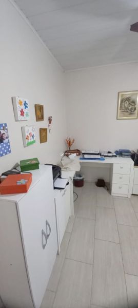 Casa com 4 quartos, 2 banheiros e 205m² à venda no bairro Centro, Pelotas