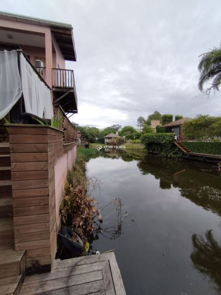 Casa com 3 quartos, 6 banheiros e 500m² à venda no bairro Marina Ilha Verde, Pelotas