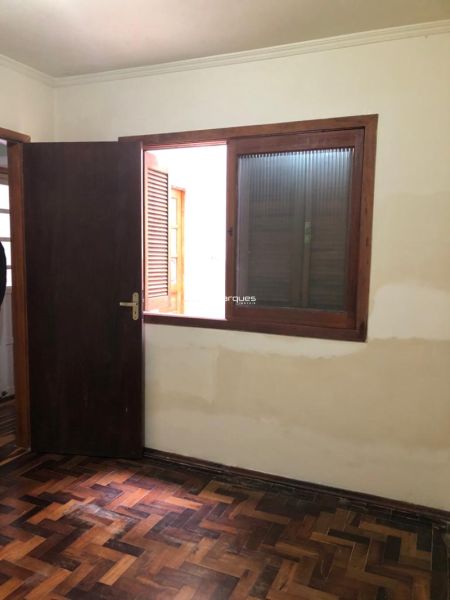 Casa com 4 quartos, 3 banheiros e 252m² à venda no bairro Centro, Pelotas