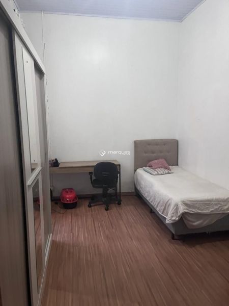 Casa com 3 quartos, 2 banheiros e 120m² à venda no bairro Centro, Pelotas
