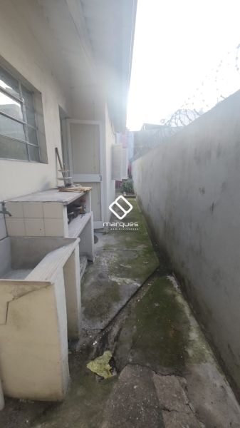 Casa com 3 quartos, 2 banheiros e 120m² à venda no bairro Centro, Pelotas