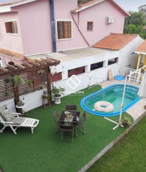 Sobrado com 3 quartos, 2 banheiros e 205m² à venda no bairro Laranjal, Pelotas