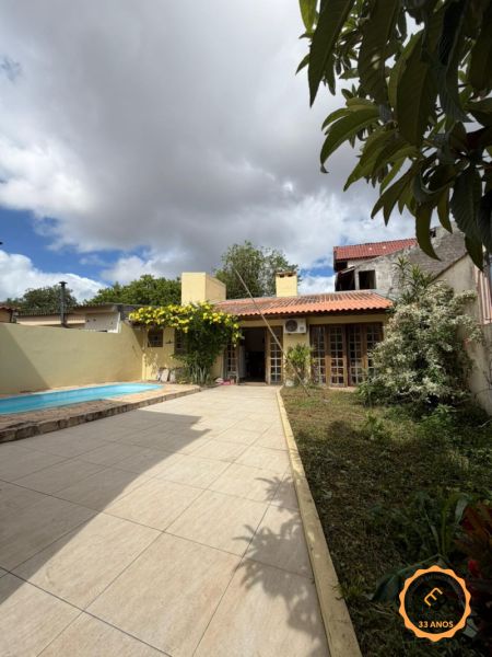 Casa com 3 quartos, 4 banheiros e 282m² à venda no bairro Areal, Pelotas
