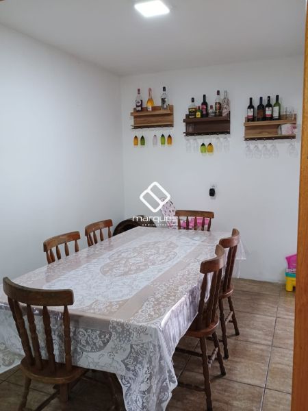 Casa com 3 quartos, 3 banheiros e 180m² à venda no bairro Areal, Pelotas