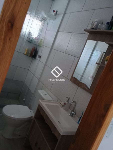Casa com 3 quartos, 3 banheiros e 180m² à venda no bairro Areal, Pelotas