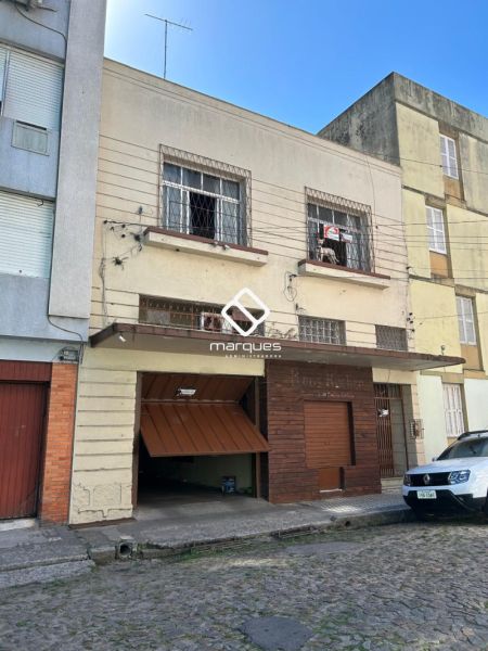Casa com 4 quartos, 3 banheiros e 242m² à venda no bairro Centro, Pelotas