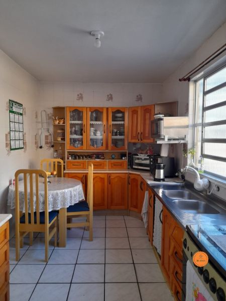 Sobrado com 4 quartos, 3 banheiros e 286m² à venda no bairro Centro, Pelotas