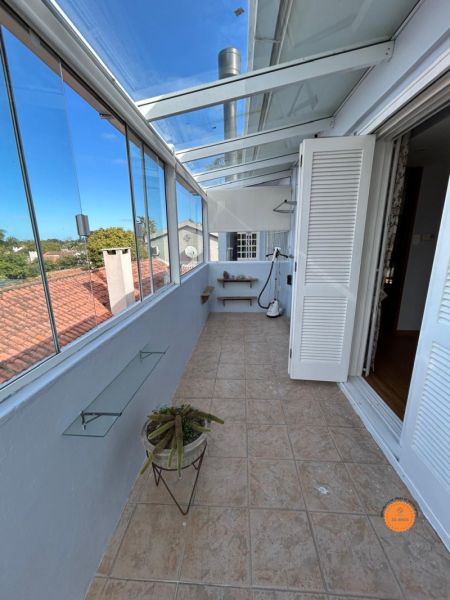 Casa com 4 quartos, 4 banheiros e 376m² à venda no bairro Laranjal, Pelotas
