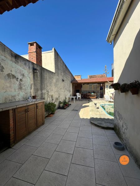 Casa com 3 quartos, 3 banheiros e 175m² à venda no bairro Centro, Pelotas