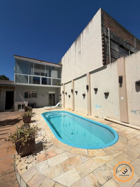 Casa com 2 quartos, 2 banheiros e 272m² à venda no bairro Laranjal, Pelotas