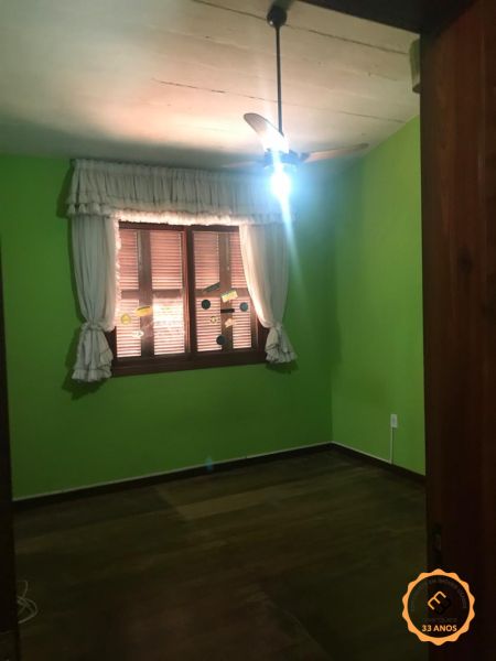 Casa com 4 quartos, 2 banheiros e 410m² à venda no bairro Centro, Pelotas