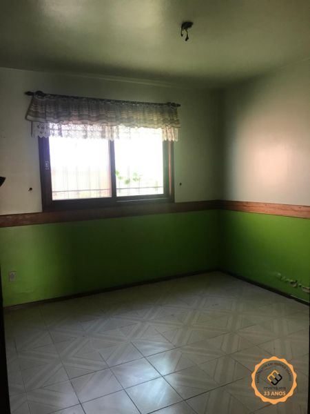 Casa com 4 quartos, 2 banheiros e 410m² à venda no bairro Centro, Pelotas