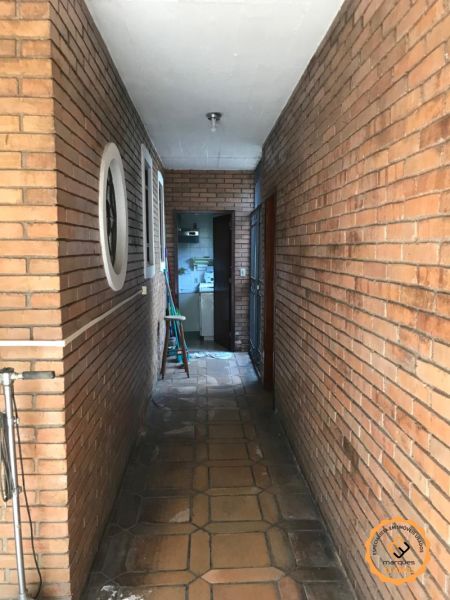 Casa com 4 quartos, 2 banheiros e 410m² à venda no bairro Centro, Pelotas