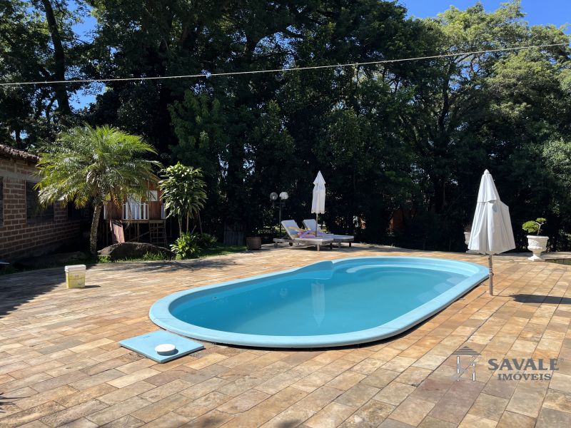 Casa com 4 quartos para alugar no bairro Várzea, Santo Antonio da Patrulha